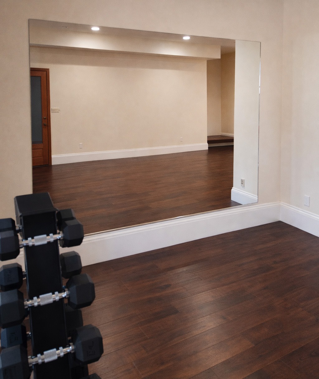 mirror home gym hardwood floor
